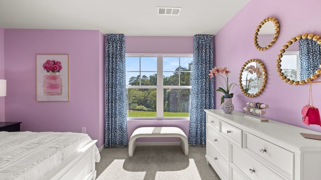 Representative furnished interior of a home built from the Halton by D.R. Horton in Brooks Station, Dacula (Image 42).
