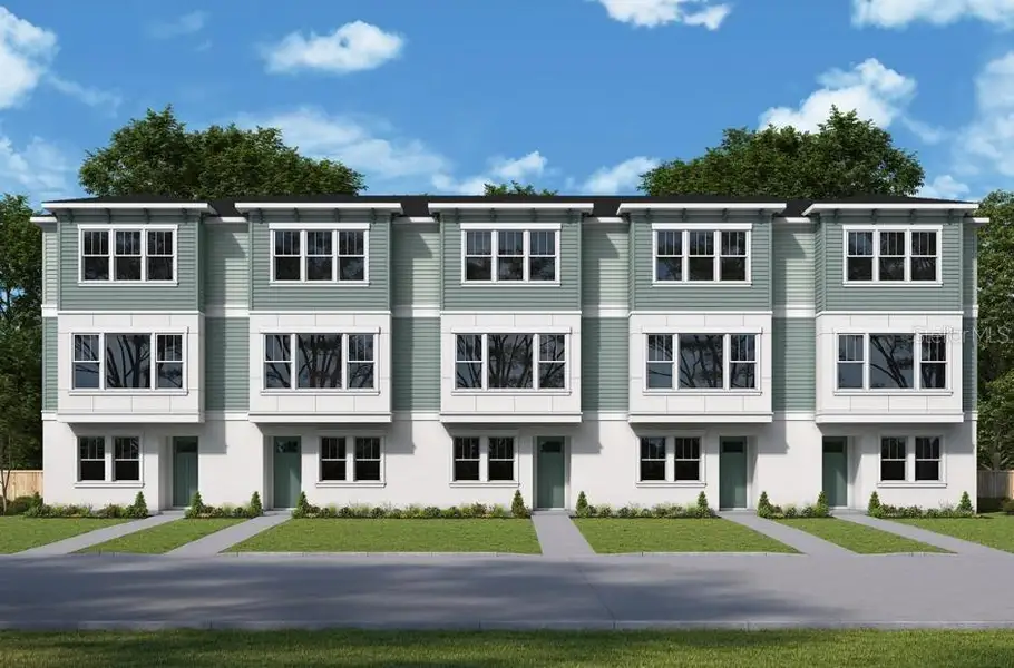 Front exterior of a new home in Towns at Union, St. Petersburg, FL, highlighting curb appeal (Image 1). Front exterior of a new home in Towns at Union, St. Petersburg, FL, highlighting curb appeal (Image 1).