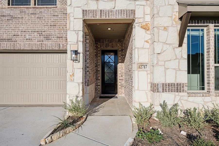 Exterior details and patio area of a home in Coyote Crossing, Godley (Image 25).
