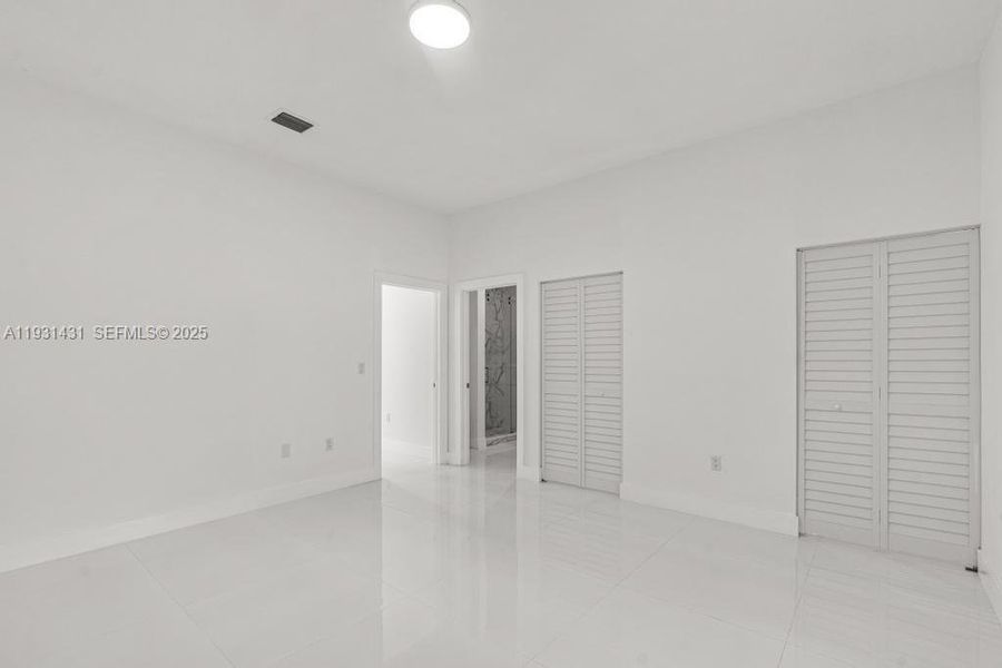 Spacious, unfurnished interior of a new home in , Miami (Image 7). Spacious, unfurnished interior of a new home in , Miami (Image 7).