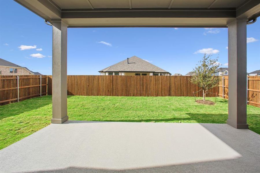 Exterior details and patio area of a home in Tavolo Park Cottages, Fort Worth (Image 2). Exterior details and patio area of a home in Tavolo Park Cottages, Fort Worth (Image 2).