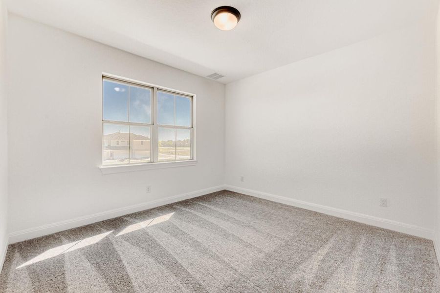 Spacious, unfurnished interior of a new home in The Porch at Du Pre, Buda (Image 19).