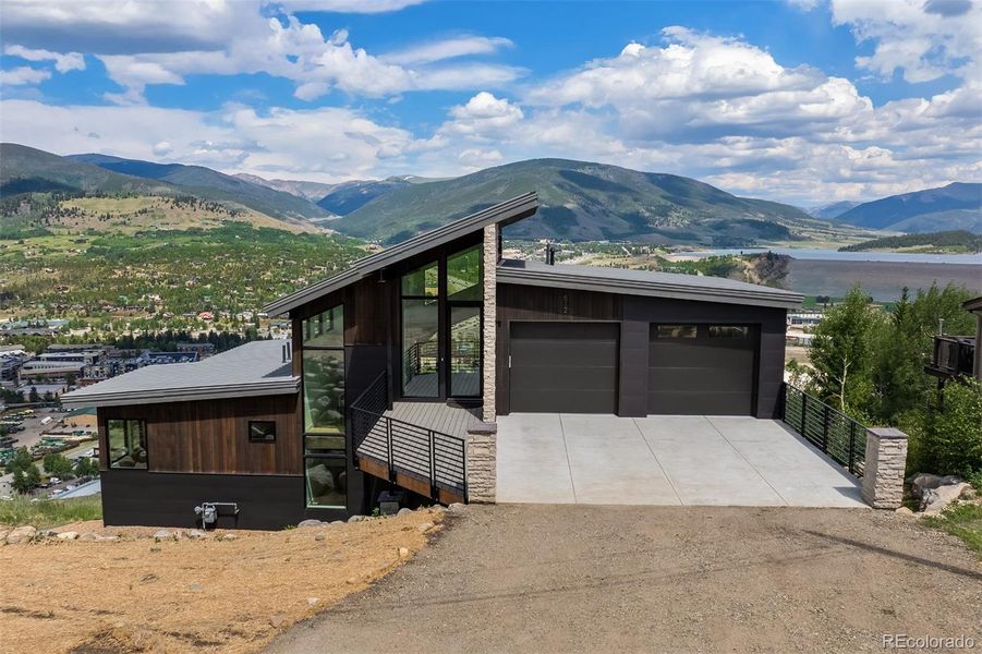 Front exterior of a new home in , Silverthorne, CO, highlighting curb appeal (Image 2).