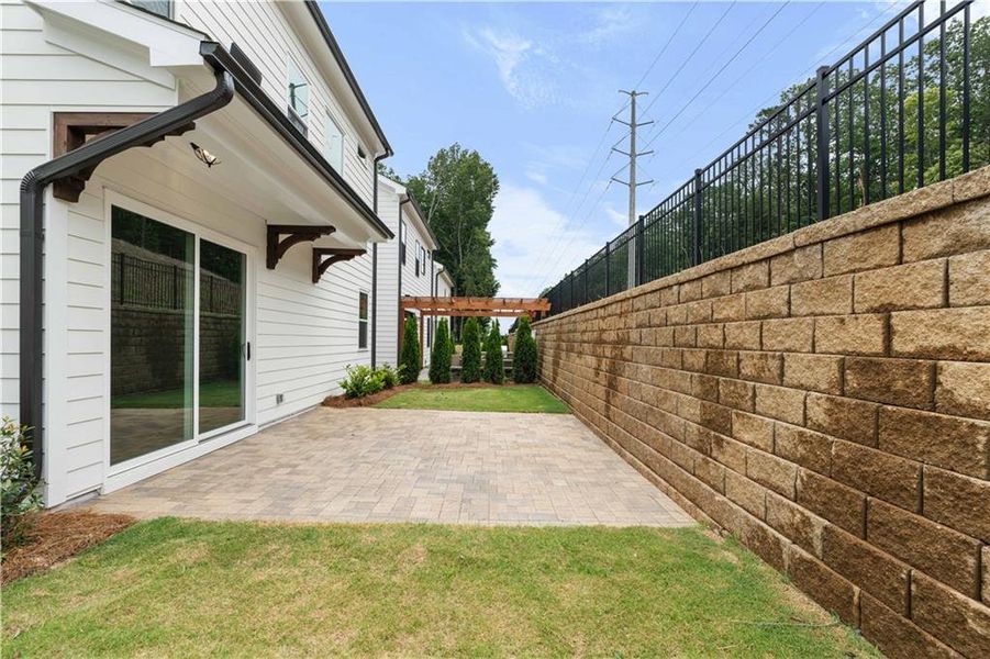 Front exterior of a new home in Palisades Single Family, Cumming, GA, highlighting curb appeal (Image 29).