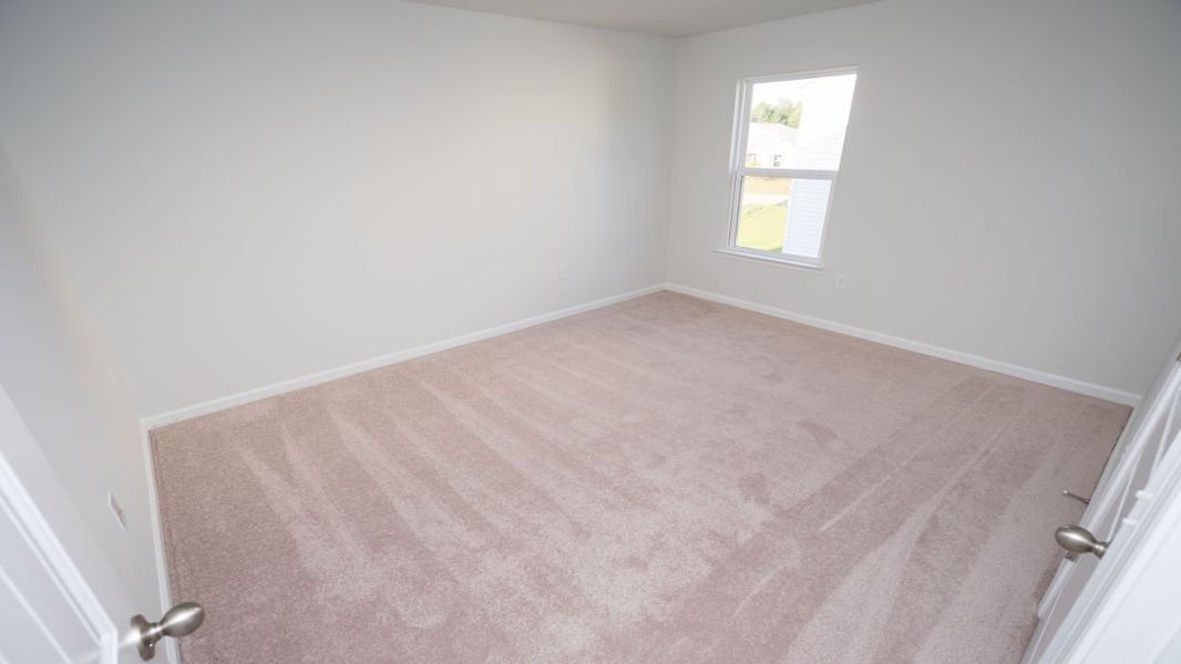 Spacious, unfurnished interior of a new home in Cedar Hill Landing, Navassa (Image 32).