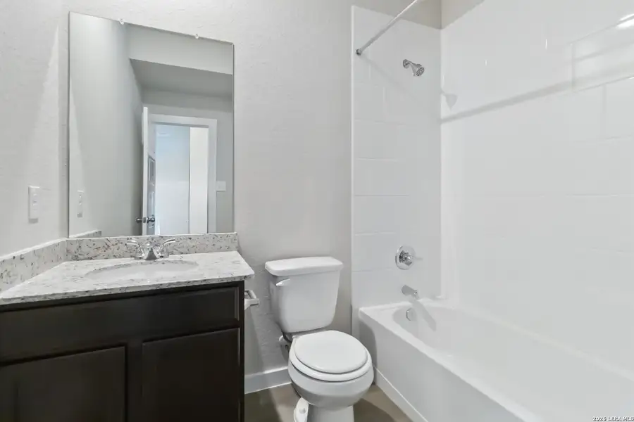 Furnished interior view inside a new home in Hunters Ranch, San Antonio (Image 9).