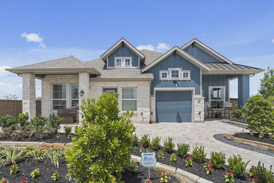 Representative exterior photo of a completed home built from the Carriagehouse by Chesmar Homes in Meridiana Townhomes, Iowa Colony, TX (Image 2). Representative exterior photo of a completed home built from the Carriagehouse by Chesmar Homes in Meridiana Townhomes, Iowa Colony, TX (Image 2).