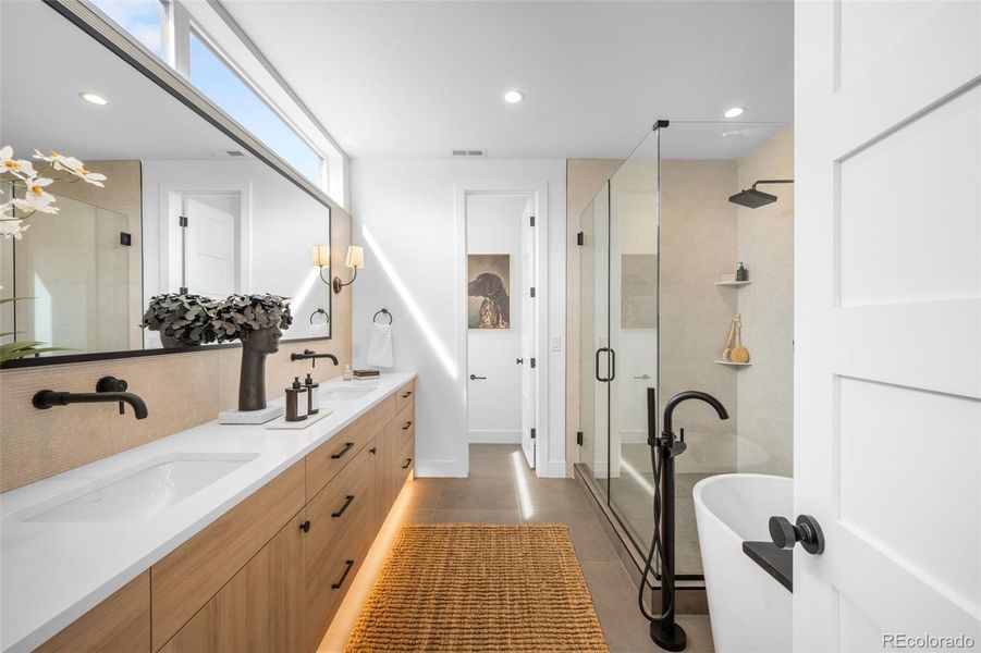 5 piece primary bathroom with kick toe lighting