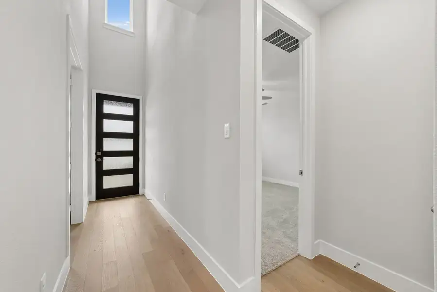 Representative unfurnished interior of a home built from the Harwood by Landon Homes in Lexington Frisco, Frisco (Image 15).