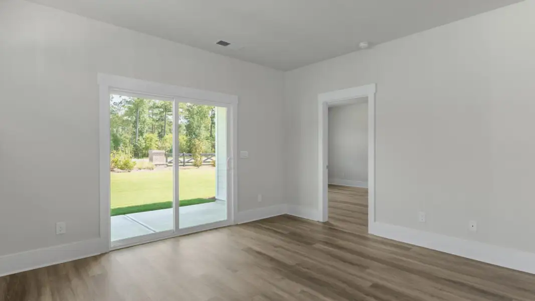 Spacious, unfurnished interior of a new home in The Retreat at Indigo Preserve Townhomes, Leland (Image 15).