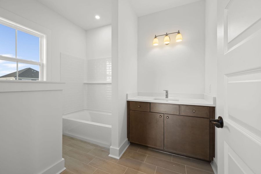 Furnished interior view inside a new home in The Domus Collection at Midtown Nexton, Summerville (Image 15).