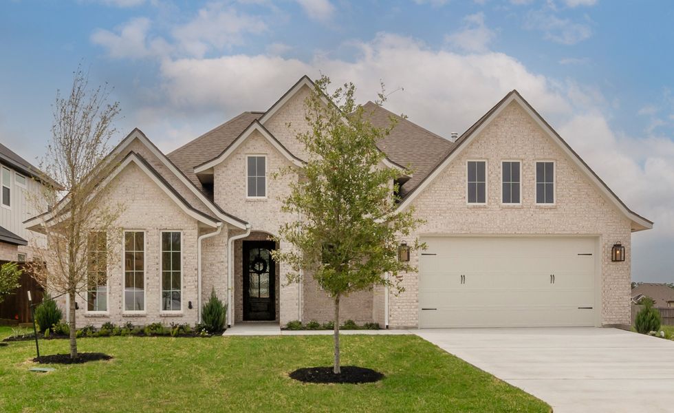Representative exterior photo of a completed home built from the The Courtney by Reece Homes in Harvest Meadows, Bryan, TX (Image 2). Representative exterior photo of a completed home built from the The Courtney by Reece Homes in Harvest Meadows, Bryan, TX (Image 2).