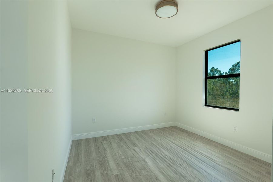 Spacious, unfurnished interior of a new home in , Lehigh Acres (Image 8).