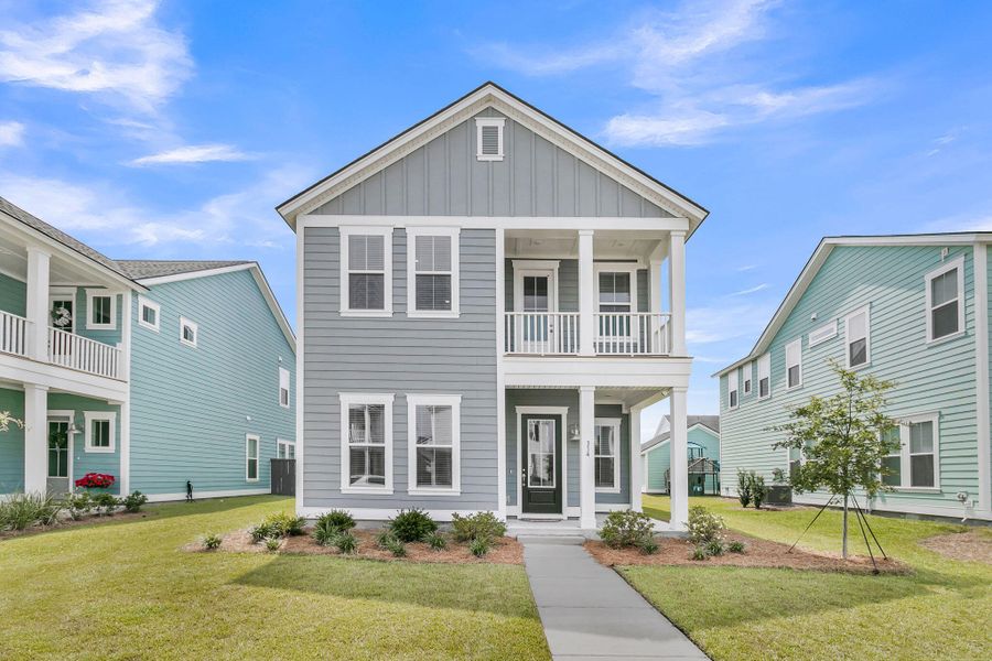 Front exterior of a new home in Carnes Crossroads, Summerville, SC, highlighting curb appeal (Image 29). Front exterior of a new home in Carnes Crossroads, Summerville, SC, highlighting curb appeal (Image 29).
