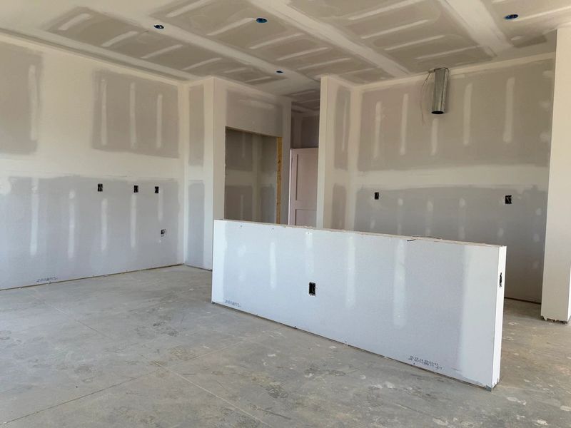 Kitchen featuring the AW Collection® Coastal - White cabinets and sea-glass tile backsplash.