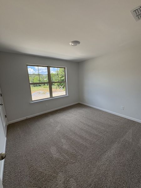 Photo is of the model home to show what the completed floor plan looks like. Selections and Options may vary.