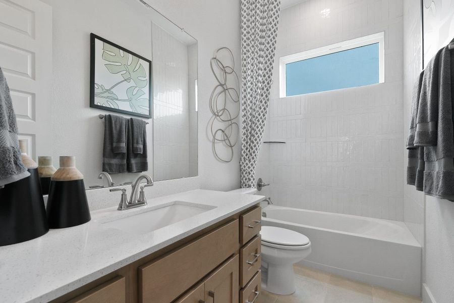 Representative furnished interior of a home built from the Madison – 50′ Lot by Chesmar Homes in Lakes of Cane Island, Katy (Image 16).