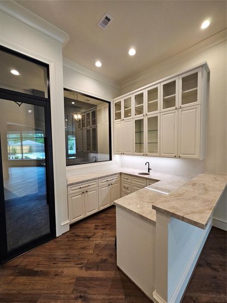 Photo Update April 2026 - Wet bar and climate controlled wine room!