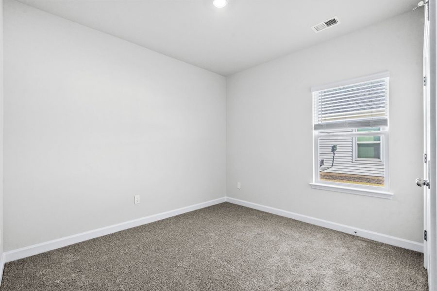 Spacious, unfurnished interior of a new home in Cypress Ridge - The Boardwalk Series, Longs (Image 25).