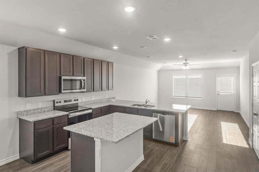 Furnished interior view inside a new home in Retreat at Fossil Creek, Fort Worth (Image 4). Furnished interior view inside a new home in Retreat at Fossil Creek, Fort Worth (Image 4).