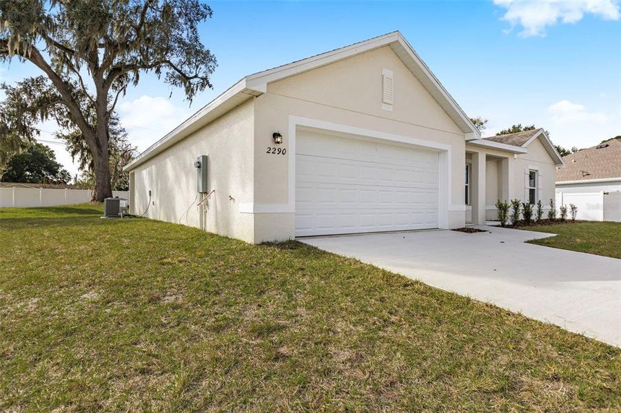 Front exterior of a new home in Sable Run, Ocala, FL, highlighting curb appeal (Image 6).