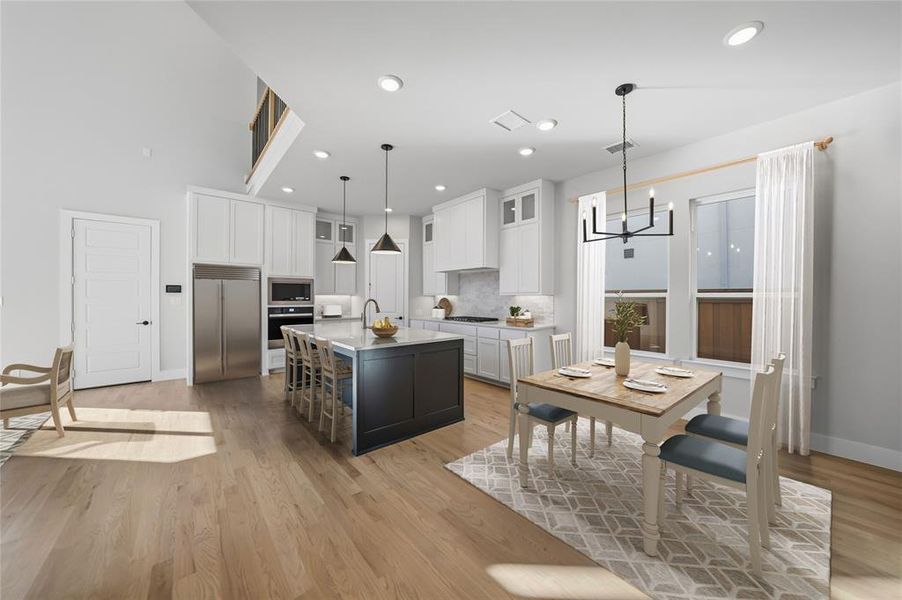 Kitchen with white cabinetry, glass insert cabinets, built in appliances, tasteful backsplash, and light wood-style floors