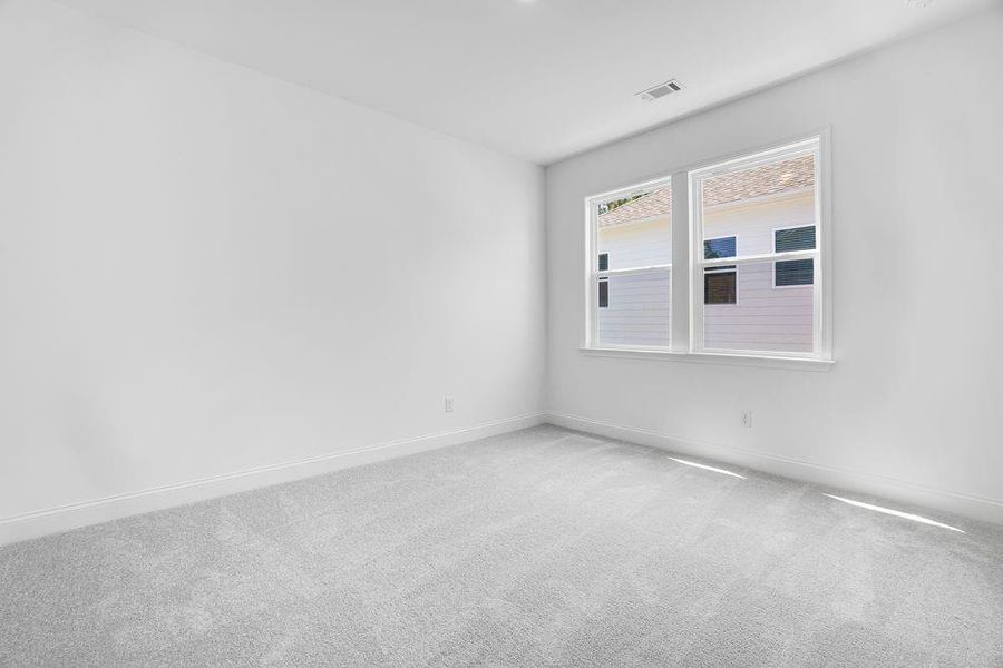 Spacious, unfurnished interior of a new home in Bailey Fence, Dacula (Image 35).