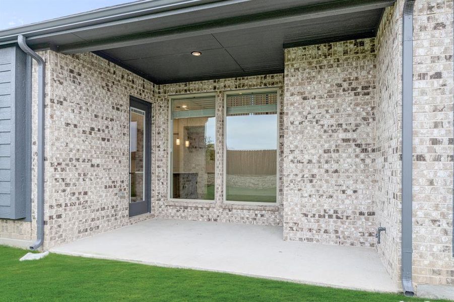 Exterior details and patio area of a home in Wildflower Ranch 60-65, Fort Worth (Image 3). Exterior details and patio area of a home in Wildflower Ranch 60-65, Fort Worth (Image 3).