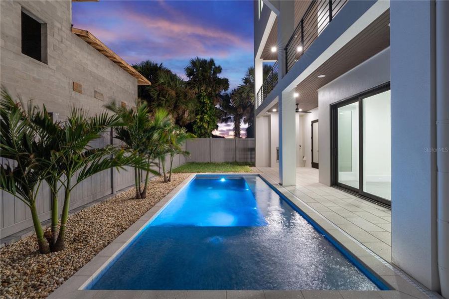 Exterior details and patio area of a home in , New Smyrna Beach (Image 59).