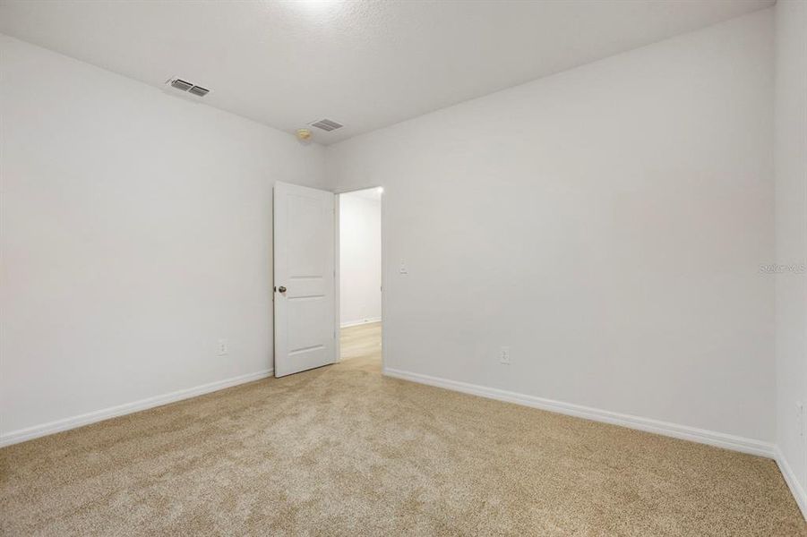 Spacious, unfurnished interior of a new home in Salt Meadows - Classic Series, Parrish (Image 21).