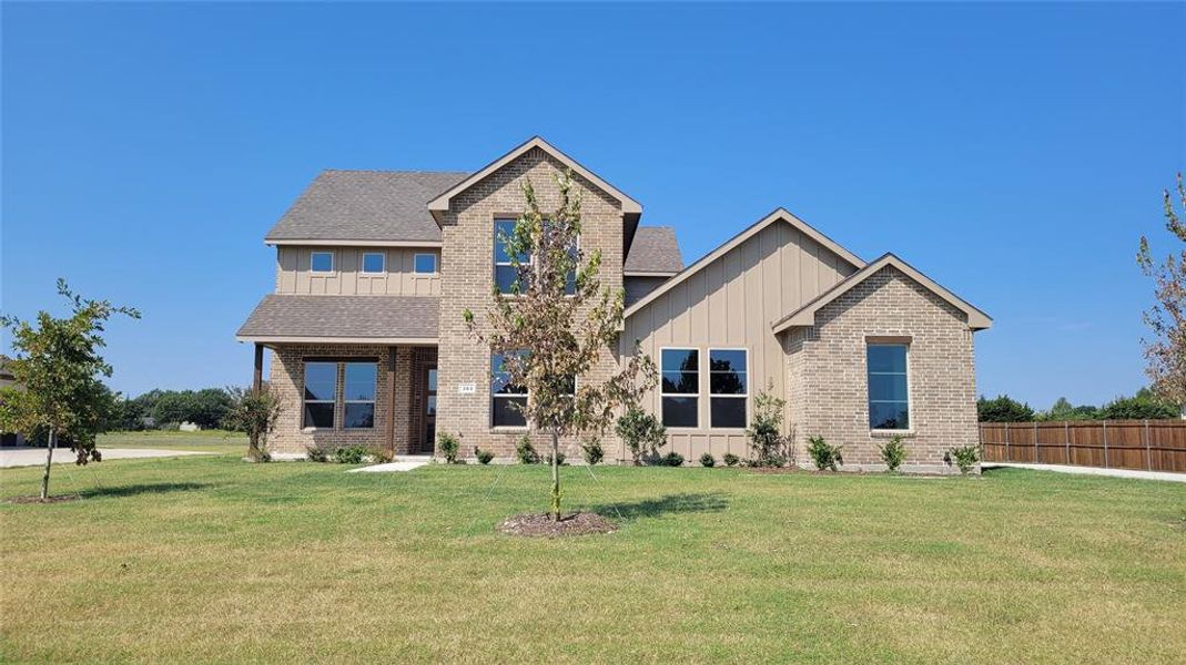 Front exterior of a new home in , Red Oak, TX, highlighting curb appeal (Image 2). Front exterior of a new home in , Red Oak, TX, highlighting curb appeal (Image 2).