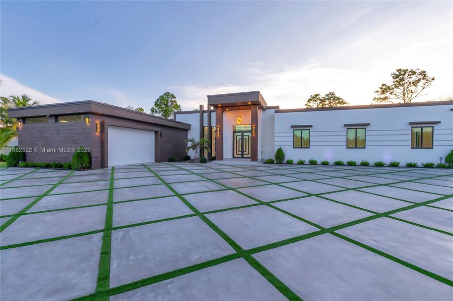 Front exterior of a new home in , Homestead, FL, highlighting curb appeal (Image 24).