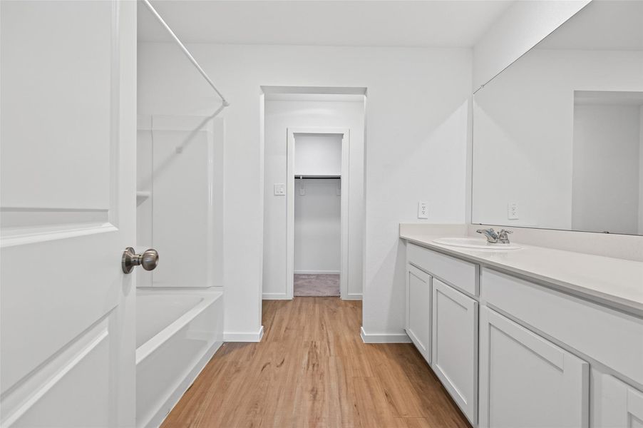 Master bathroom has tub shower combo. Master bathroom has tub shower combo.