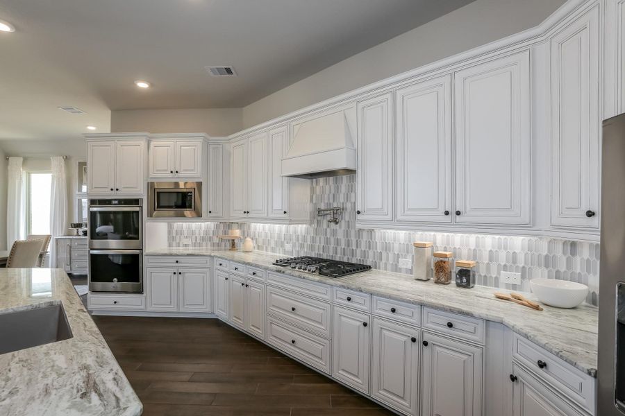 Furnished interior view inside a new home in Valencia: Hilltop Collection, Manvel (Image 44).