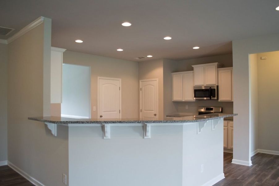 Representative furnished interior of a home built from the Richmond by Piedmont Residential in The Reserve at Willow Oaks, Canton (Image 6).