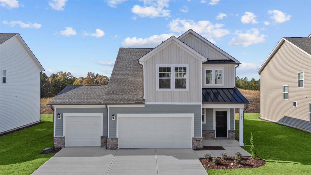 Representative exterior photo of a completed home built from the Freesia by DRB Homes in Essex Village, Franklinton, NC (Image 24).