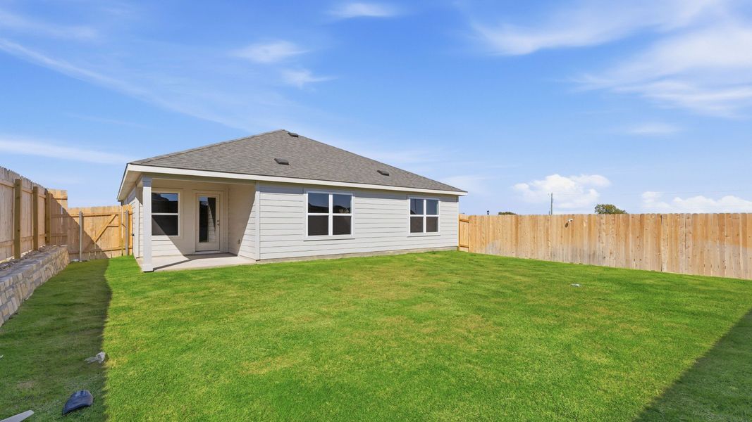Exterior details and patio area of a home in Hunters Glen, Jarrell (Image 3).
