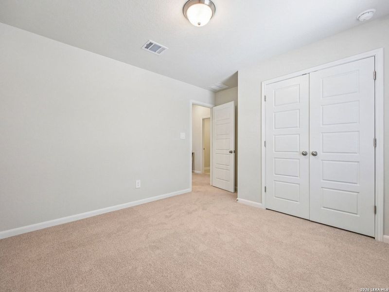 Spacious, unfurnished interior of a new home in Remington Ranch, San Antonio (Image 13).
