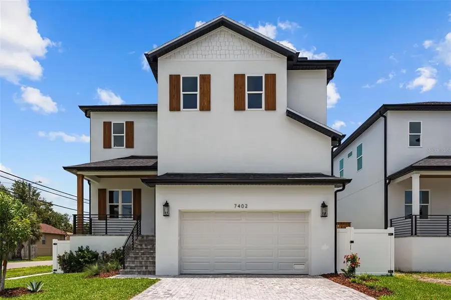 Front exterior of a new home in , Tampa, FL, highlighting curb appeal (Image 2). Front exterior of a new home in , Tampa, FL, highlighting curb appeal (Image 2).
