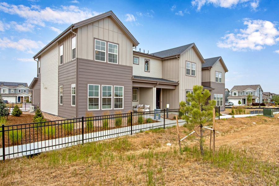 Representative exterior photo of a completed home built from the B by Tri Pointe Homes in Candelas Townhomes, Arvada, CO (Image 1). Representative exterior photo of a completed home built from the B by Tri Pointe Homes in Candelas Townhomes, Arvada, CO (Image 1).
