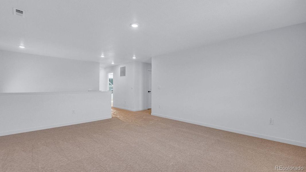 Spacious, unfurnished interior of a new home in Trails at Crowfoot, Parker (Image 34).