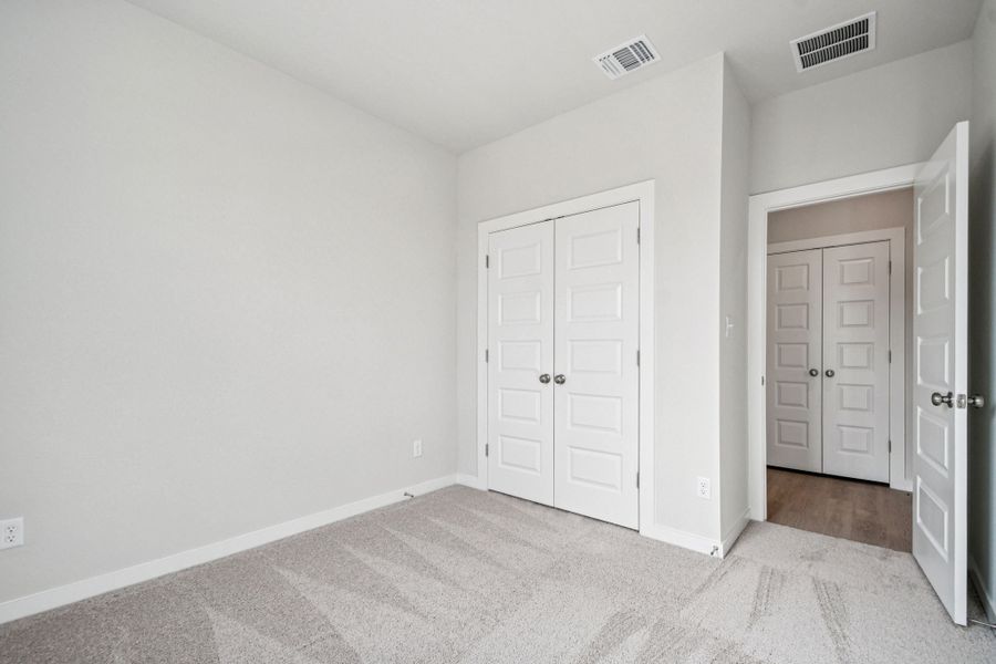 A room with white doors.
