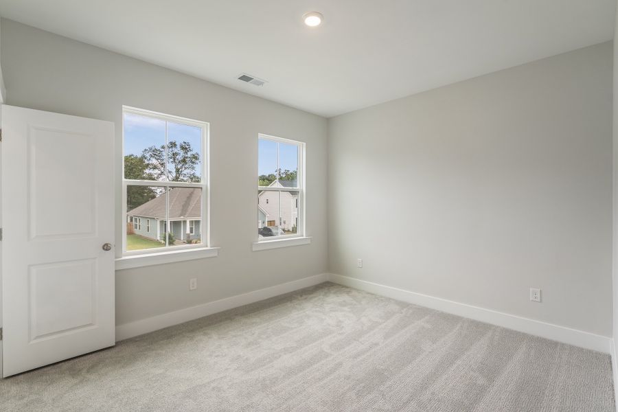 Spacious, unfurnished interior of a new home in Cottages at Lake Emory, Inman (Image 28). Spacious, unfurnished interior of a new home in Cottages at Lake Emory, Inman (Image 28).