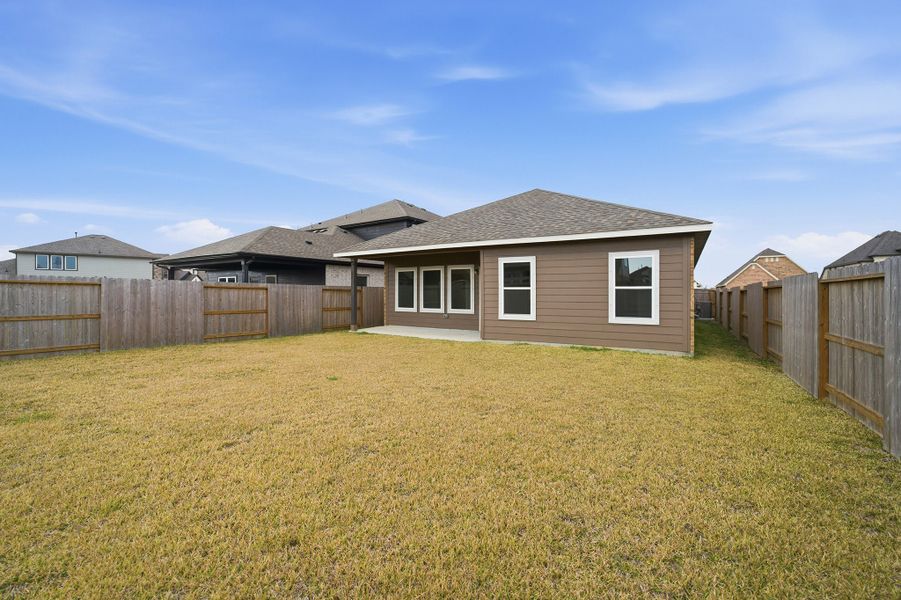Exterior details and patio area of a home in Windrose Green, Angleton (Image 3). Exterior details and patio area of a home in Windrose Green, Angleton (Image 3).