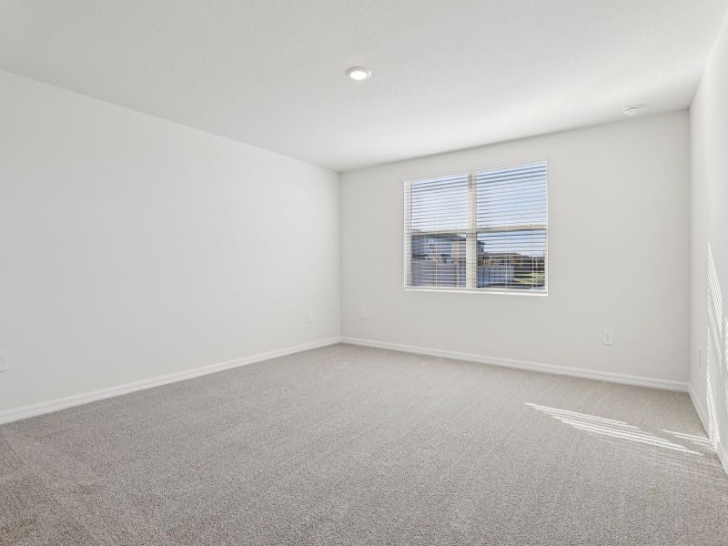 Spacious, unfurnished interior of a new home in Lake Deer Estates - Signature Series, Poinciana (Image 11).