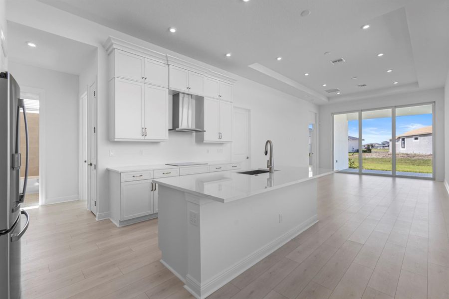 Furnished interior view inside a new home in PGA Village Verano, Port St. Lucie (Image 13).