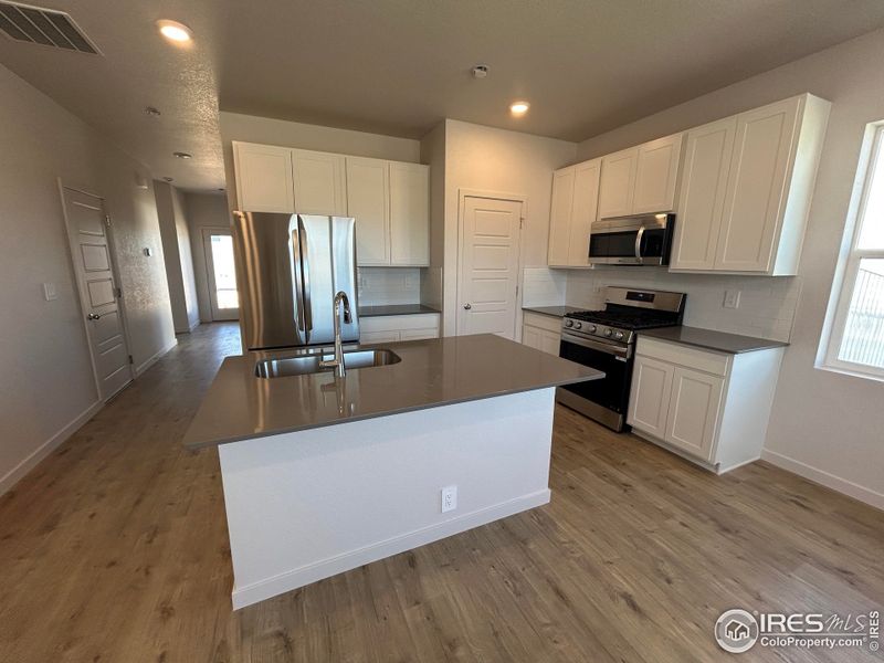 Furnished interior view inside a new home in Liberty Draw, Evans (Image 3).