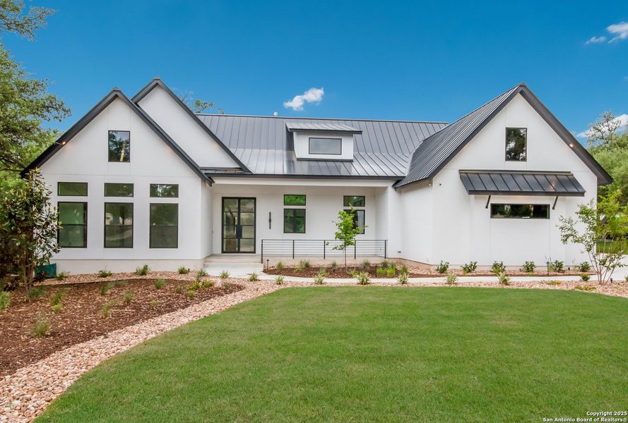Front exterior of a new home in , Spring Branch, TX, highlighting curb appeal (Image 20). Front exterior of a new home in , Spring Branch, TX, highlighting curb appeal (Image 20).