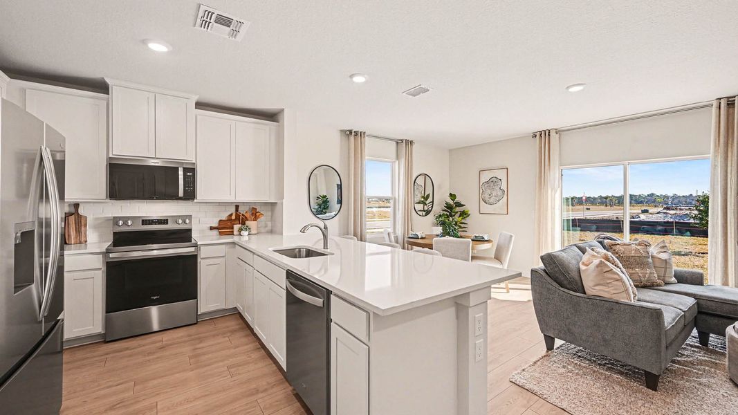 Representative furnished interior of a home built from the San Marco Exterior by D.R. Horton in Venetian Grove, Vero Beach (Image 9).
