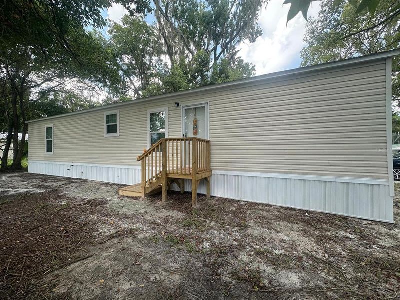 Exterior details and patio area of a home in , Lake City (Image 13).